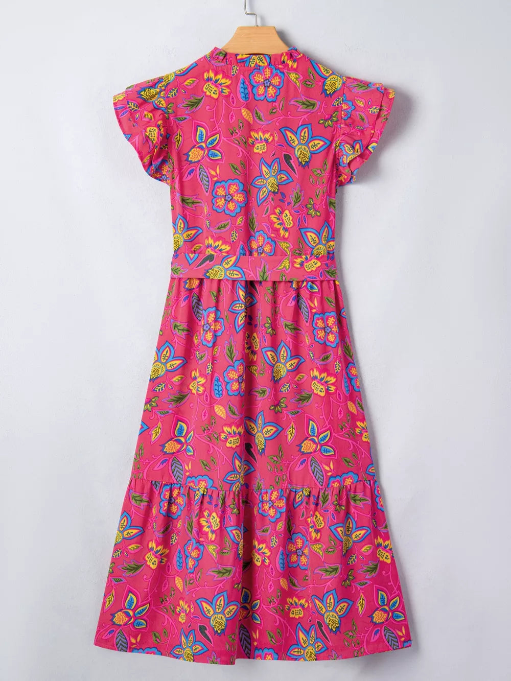 Floral midi dress with ruffled sleeves in cotton blend, featuring a tiered skirt and vibrant floral print.