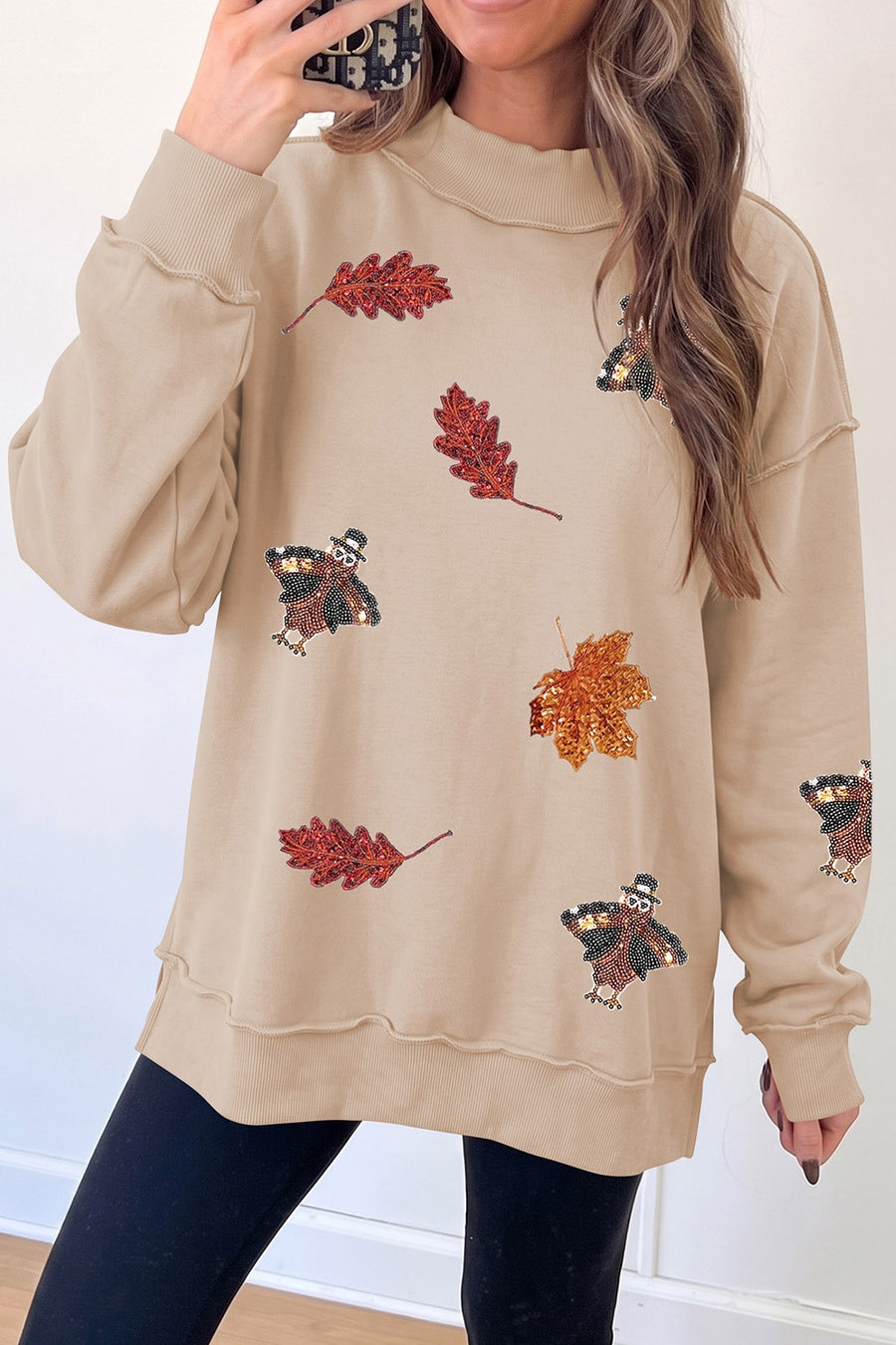 65% polyester, 35% cotton Care instructions: Machine wash cold sweatshirt in beige with relaxed silhouette