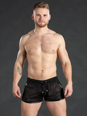 Black athletic mesh shorts with white trim and drawstring waist.