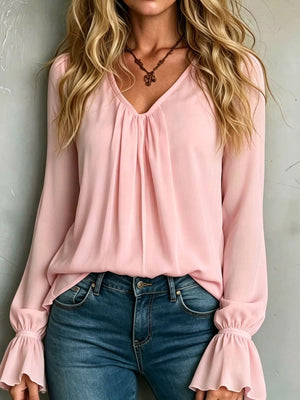 blouse in blush pink featuring v-neck and relaxed fit