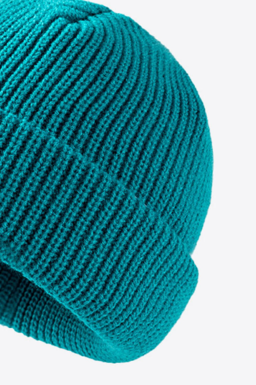 Teal ribbed knit beanie with folded edge detail
