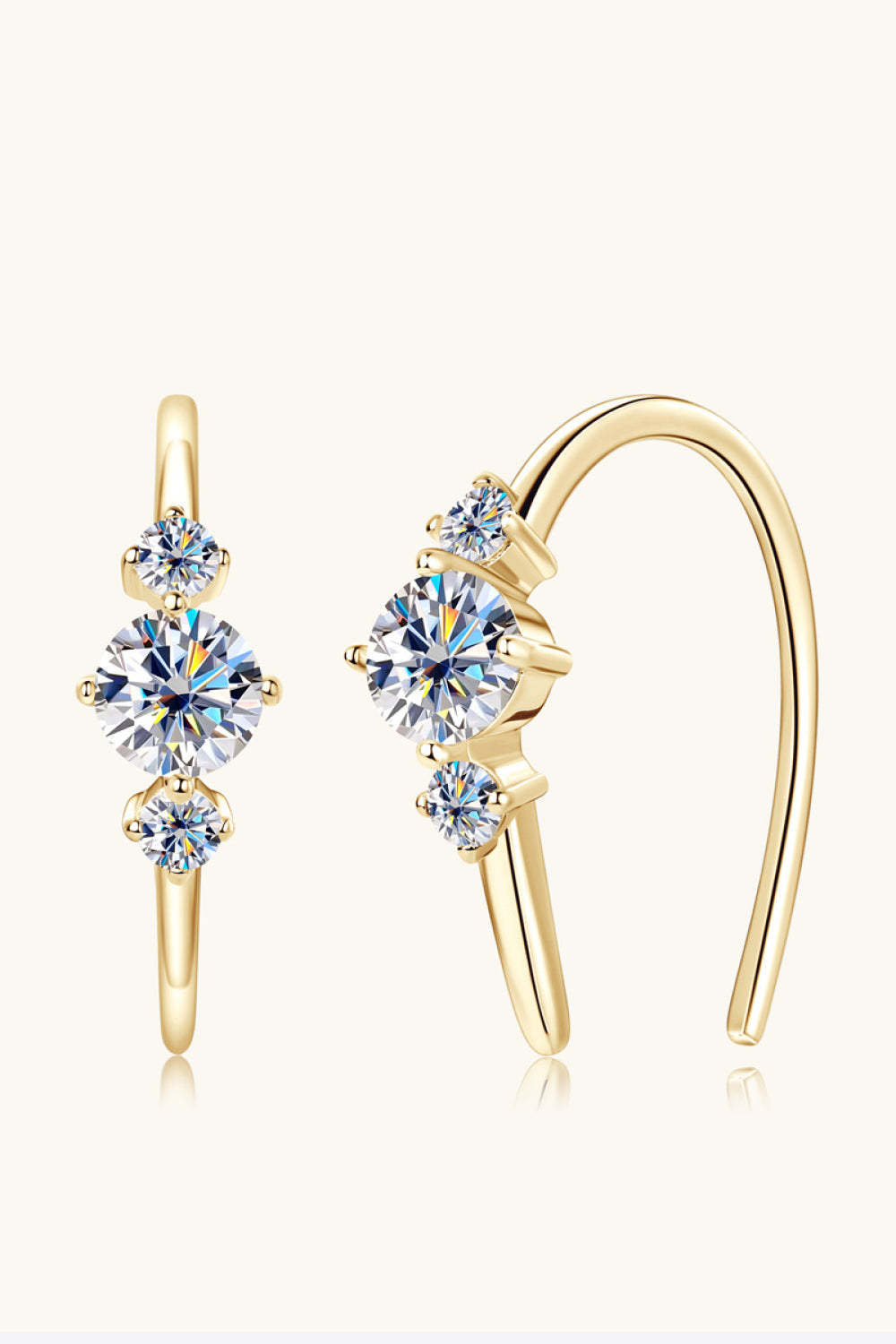 Gold diamond ear climbers with celestial-inspired design