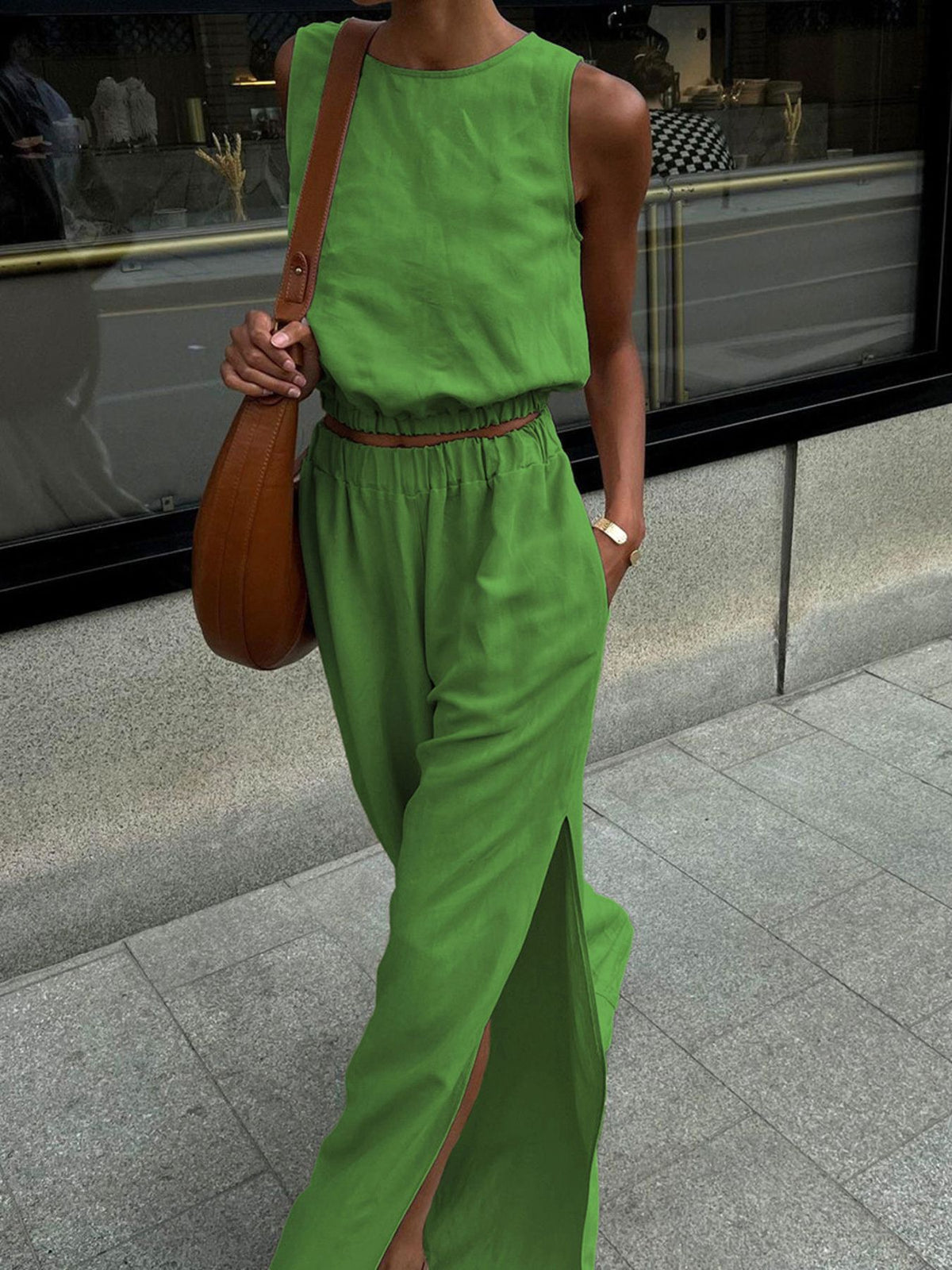 Green crew neck sleeveless crop top and wide-leg pants set with high slits