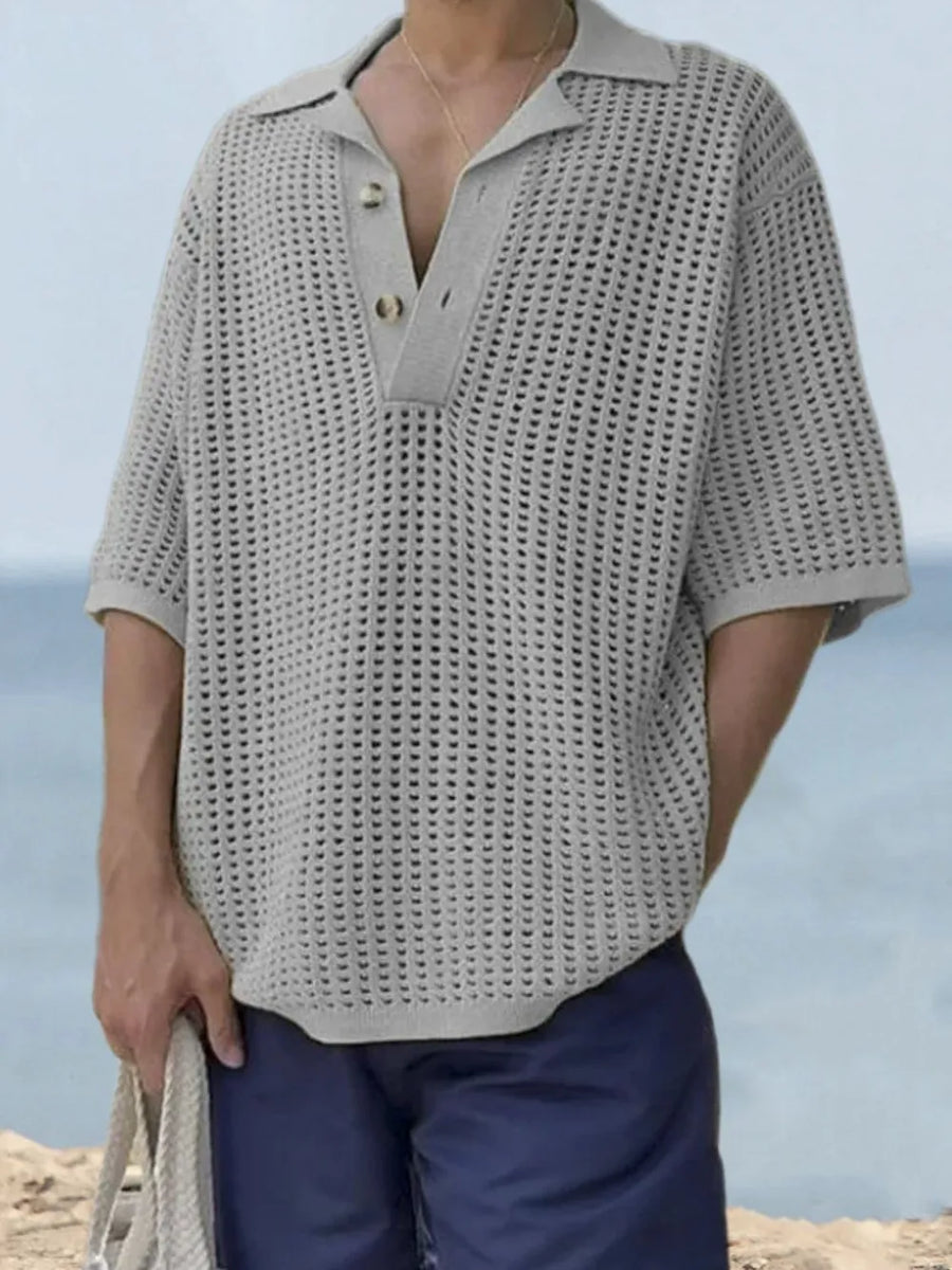 Gray open-knit polo shirt with pointed collar and short sleeves.