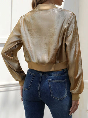 Gold cropped bomber jacket with a textured metallic finish and ribbed cuffs and hem.