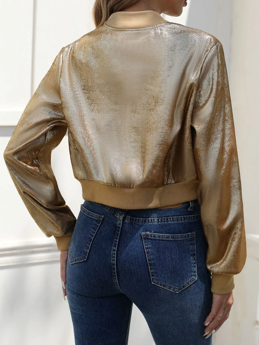 Gold cropped bomber jacket with a textured metallic finish and ribbed cuffs and hem.