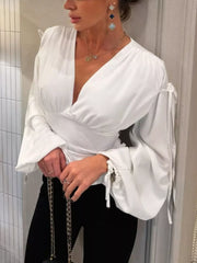 white blouse with waist-length and tie