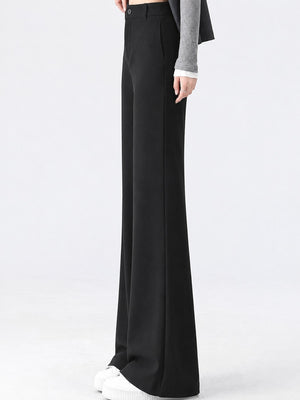 Polyester 89 trousers in black with flared silhouette