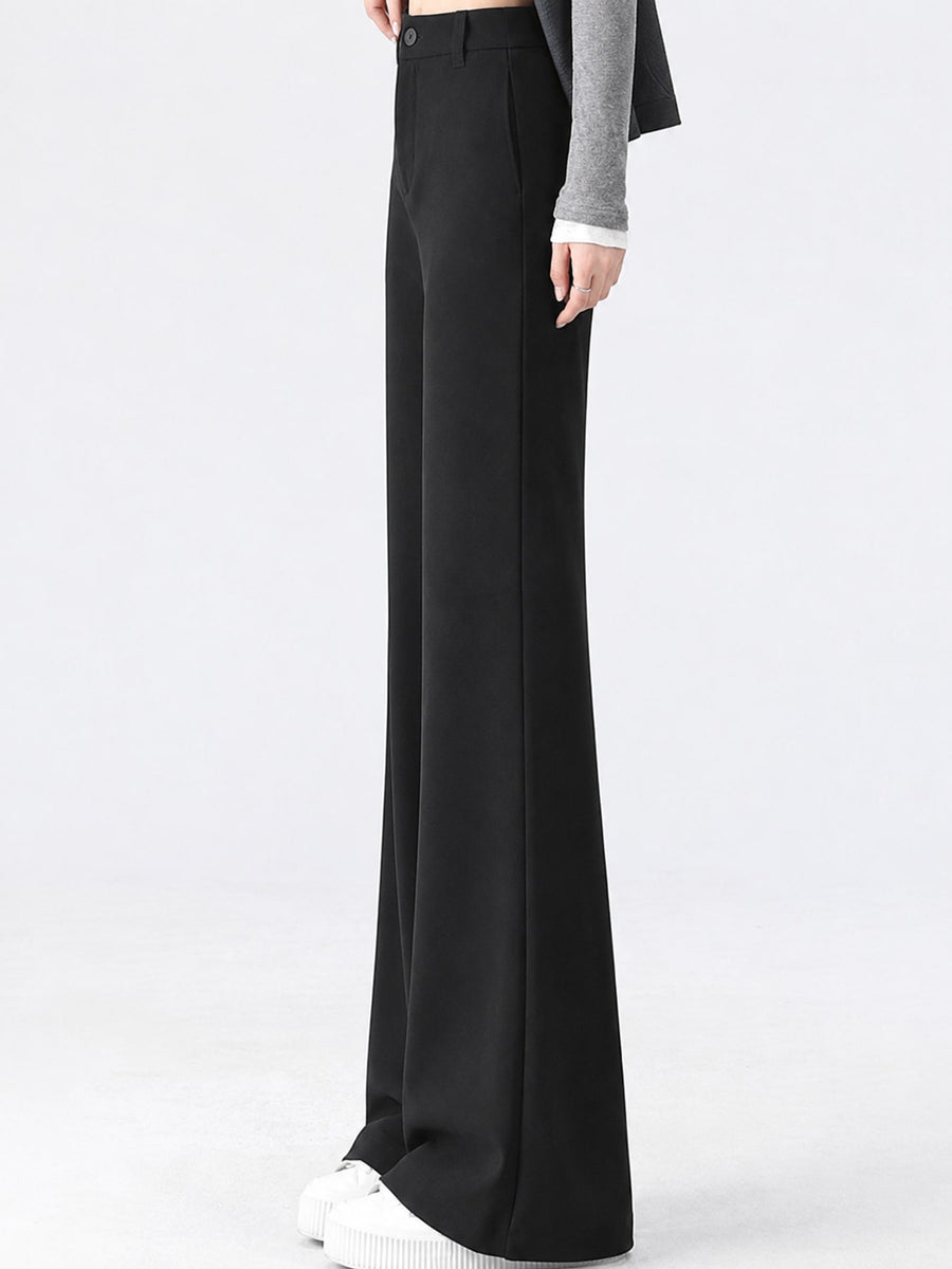 Polyester 89 trousers in black with flared silhouette