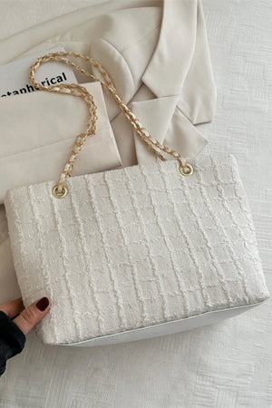 White textured bouclé shoulder bag with gold chain strap