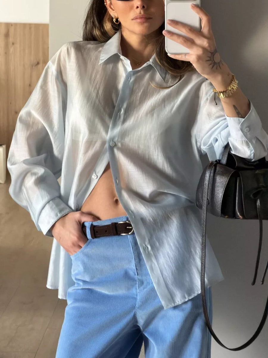 button-up shirt in light green with sheer and hip-length