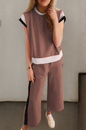 Colorblock sportswear set with contrast trim in Hot Pink and Black.