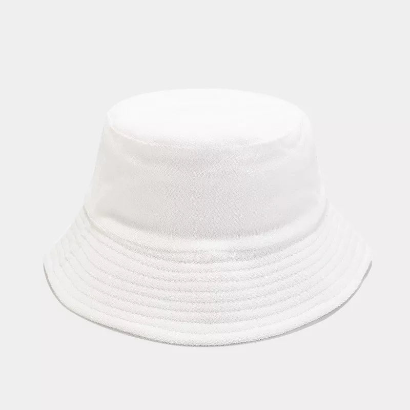 hat in white featuring wide brim and relaxed fit