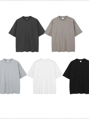 Oversized washed cotton tee in mocha, dark gray, black, gray, and white.