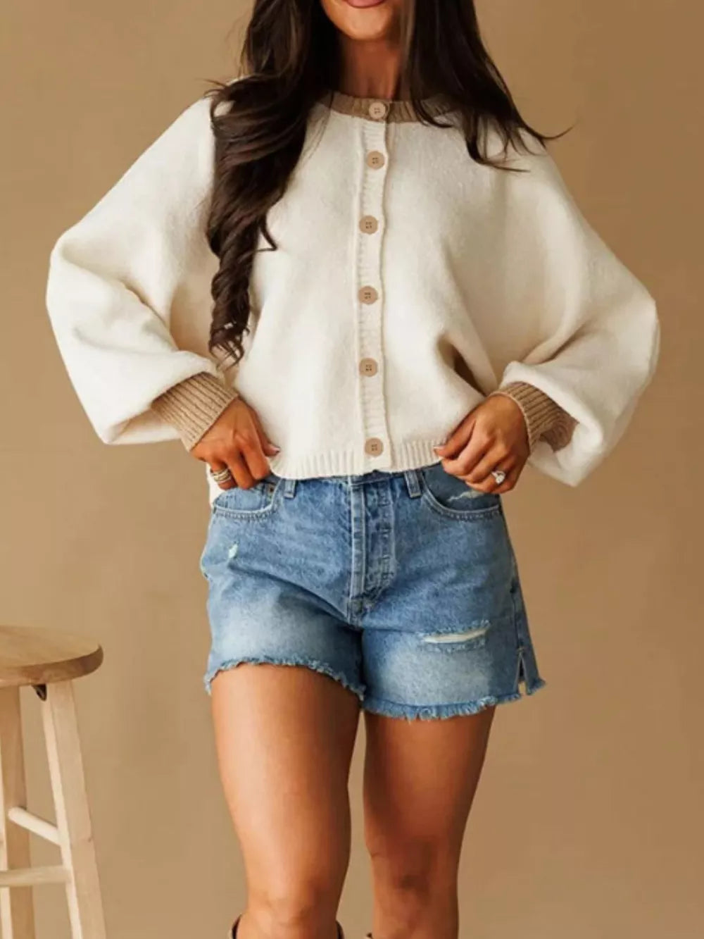 100% polyester Care instructions: Machine wash cold cardigan in Ivory with relaxed silhouette