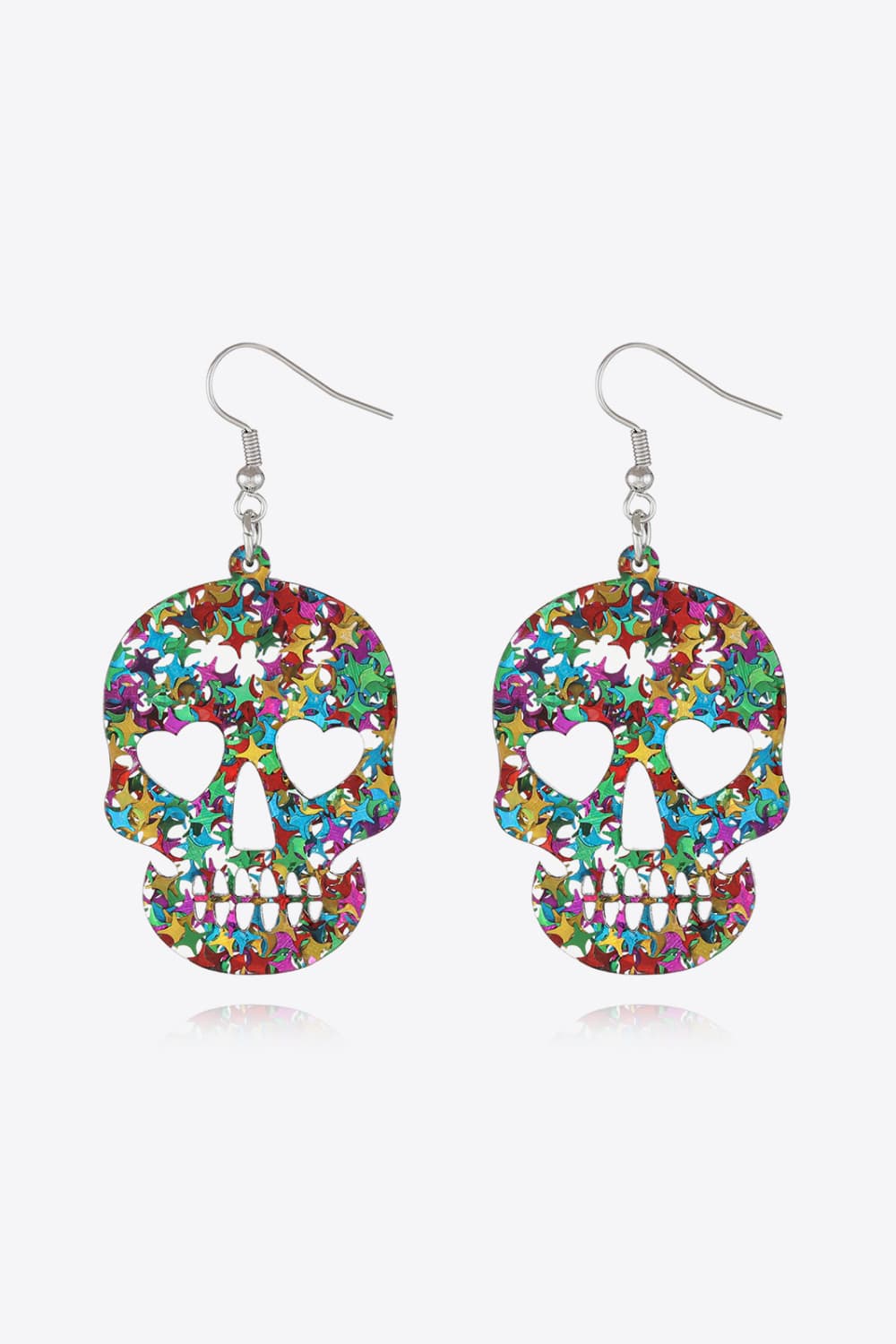 Glitter skull starburst dangle earrings with heart eye cutouts in multicolor acrylic.