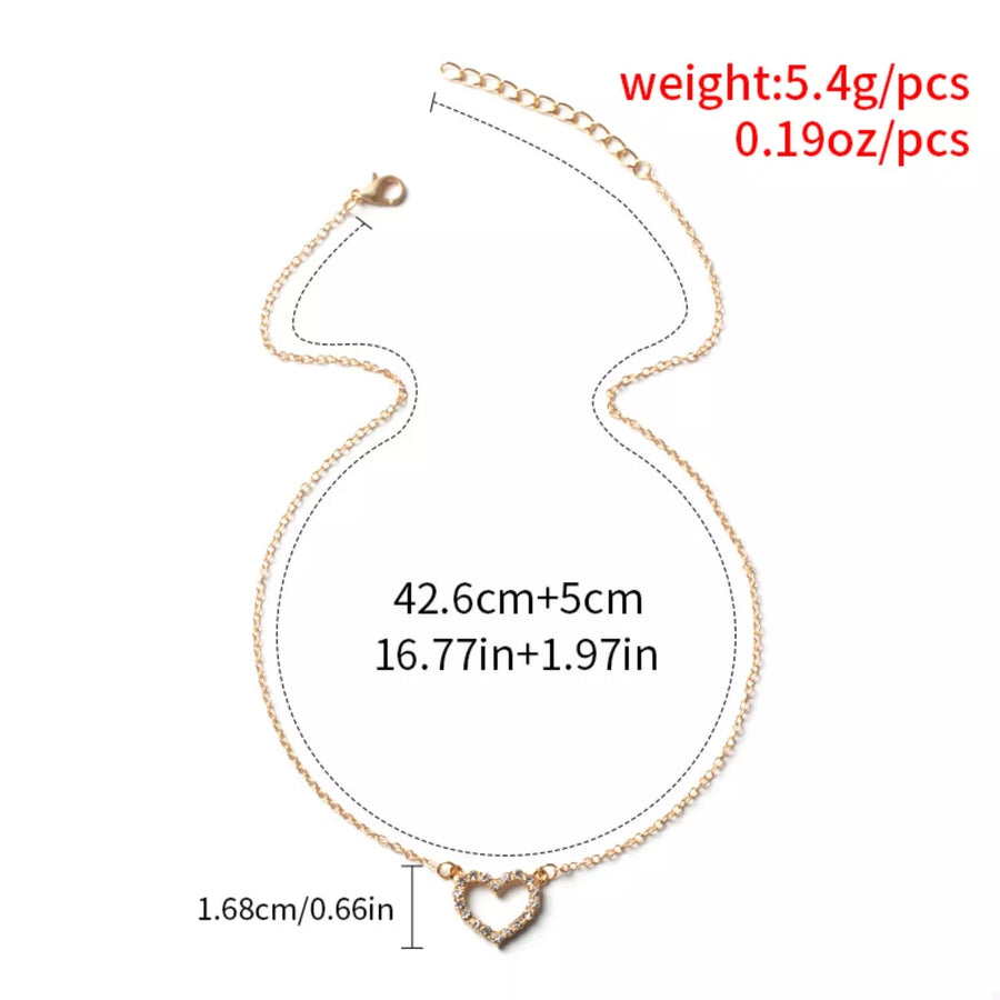 Gold dainty heart pendant necklace with adjustable chain, 18K gold-plated.
