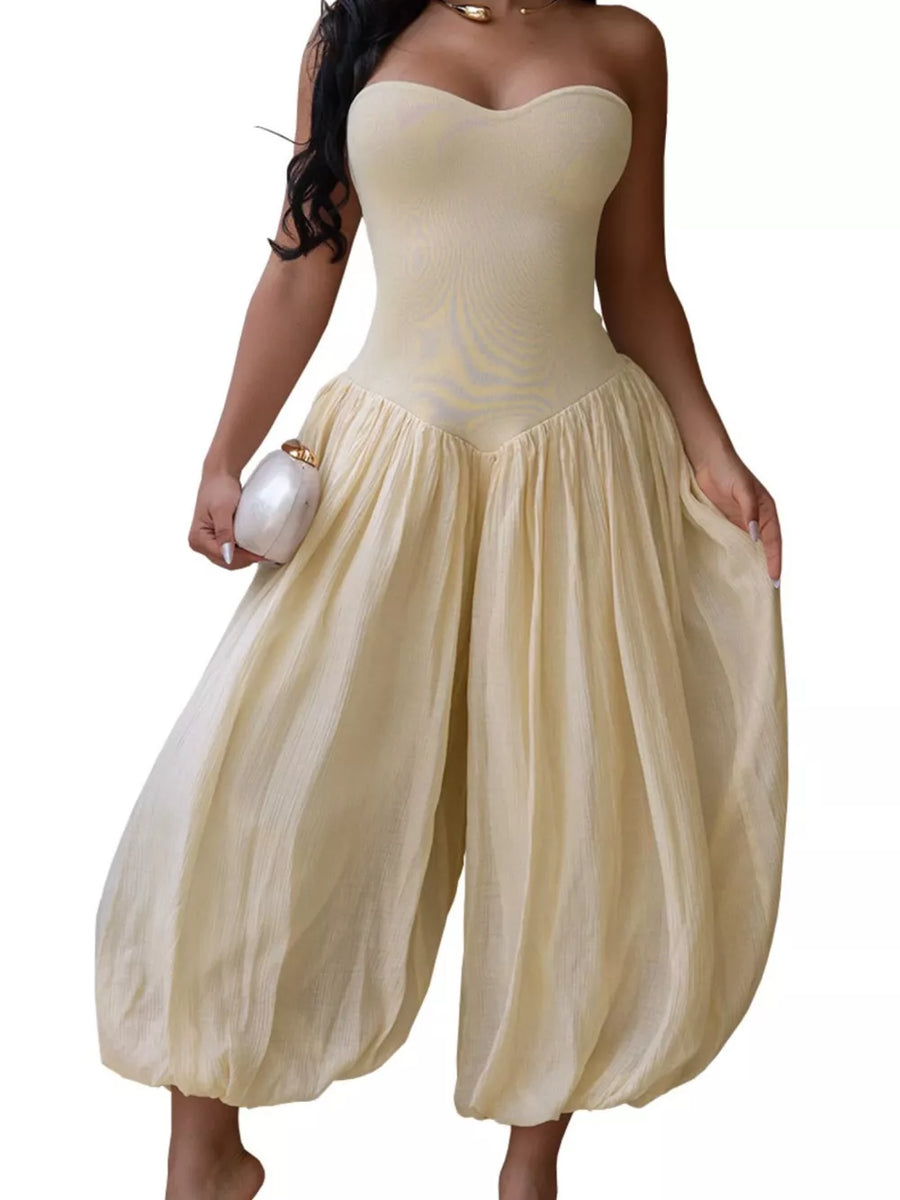 100% polyester Care instructions: Machine wash cold jumpsuit in Tan with loose silhouette