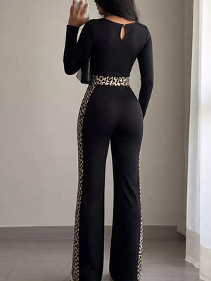 100% polyester Care instructions: Machine wash cold jumpsuit in Black with fitted silhouette