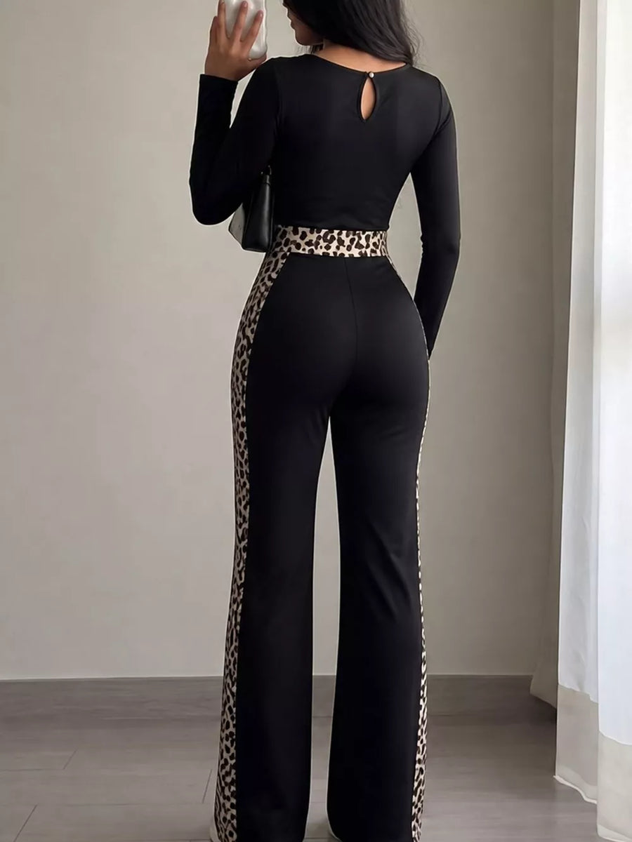 100% polyester Care instructions: Machine wash cold jumpsuit in Black with fitted silhouette