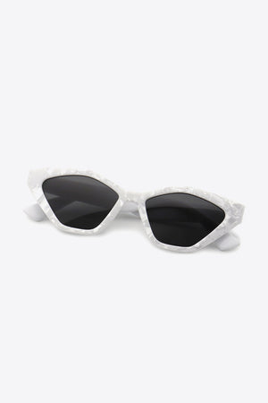 Geometric cat-eye sunglasses in light gray marble pattern with black lenses.