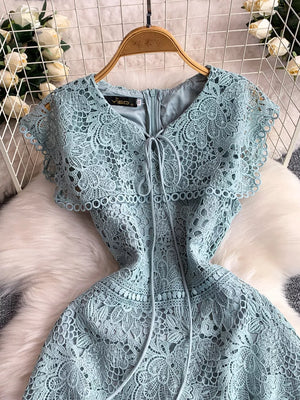 Sky blue lace A-line dress with V-neck and tie detail