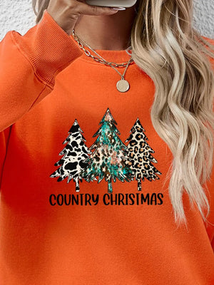 Orange crewneck sweatshirt with graphic trees and "Country Christmas" text.