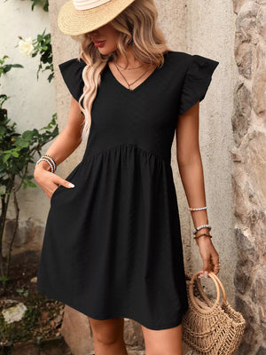 Black a-line dress with ruffled sleeves, V-neck, and textured fabric.