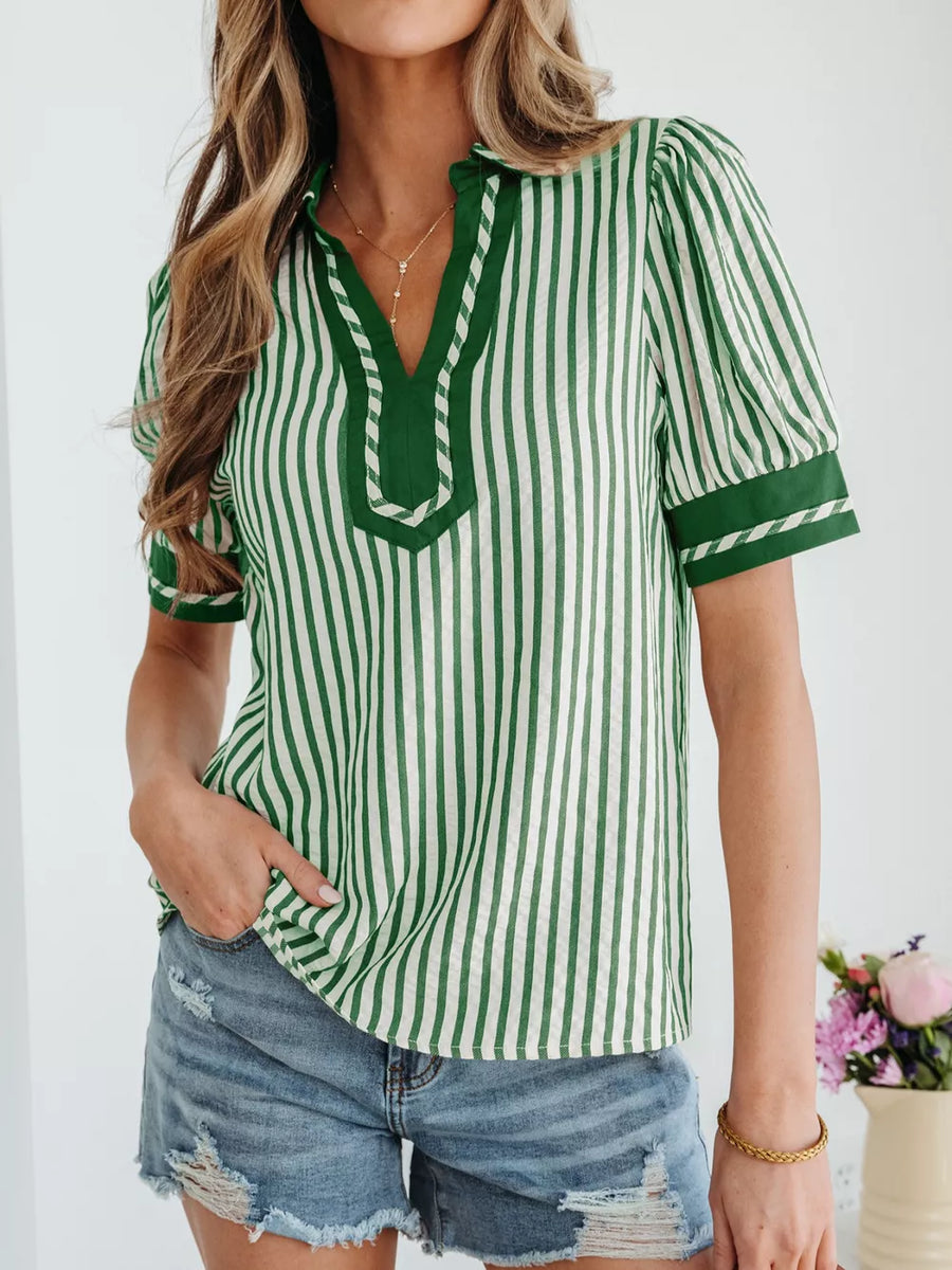 Green and white striped collared split neck blouse with bubble sleeves and decorative trim.