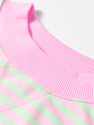 light pink sweatshirt with hip-length and pullover