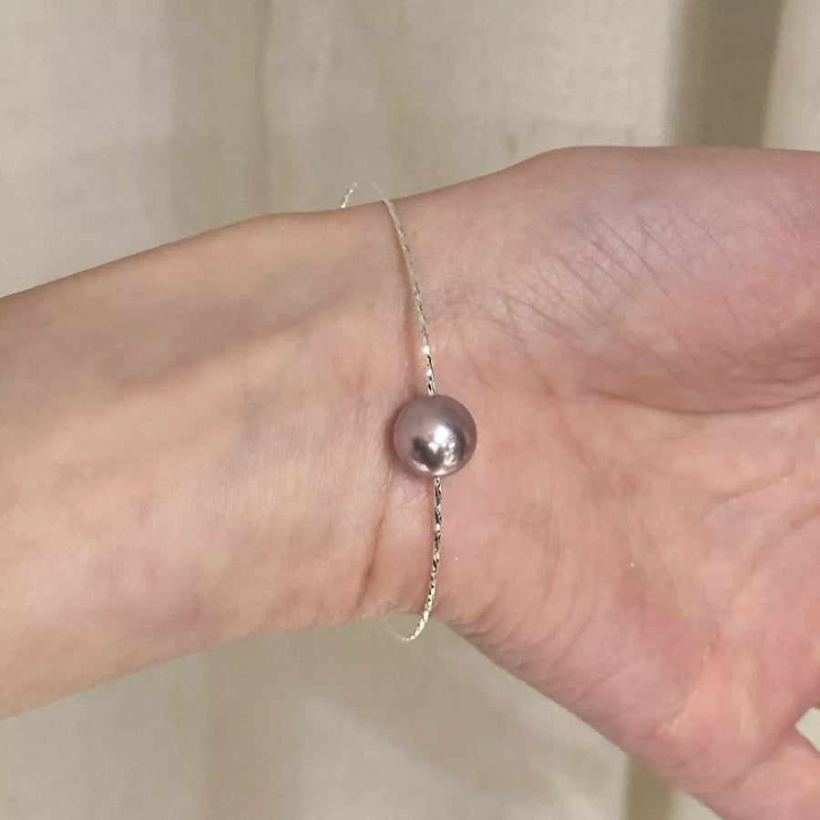 Synthetic Pearl,925 sterling silver Care instructions: Avoid wearing during exer bracelet in lavender with fitted silhouette
