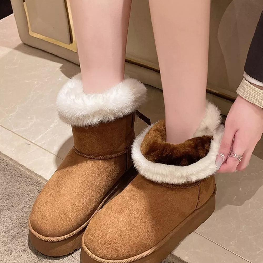 Cozy caramel suede round-toe boots with white faux fur lining.