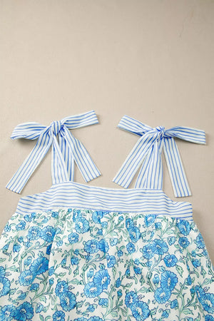 Botanical print mini dress with blue stripe tie straps and bodice