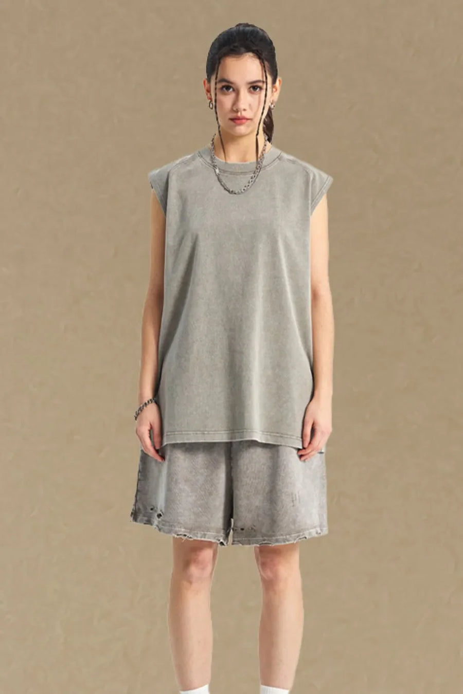 Acid wash relaxed fit tank top in dark gray with a crew neck and sleeveless design.