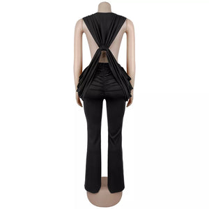 glam jumpsuit in black with deep v-neck