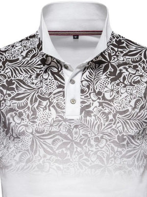 Floral ombre polo shirt with a white collar and button placket.