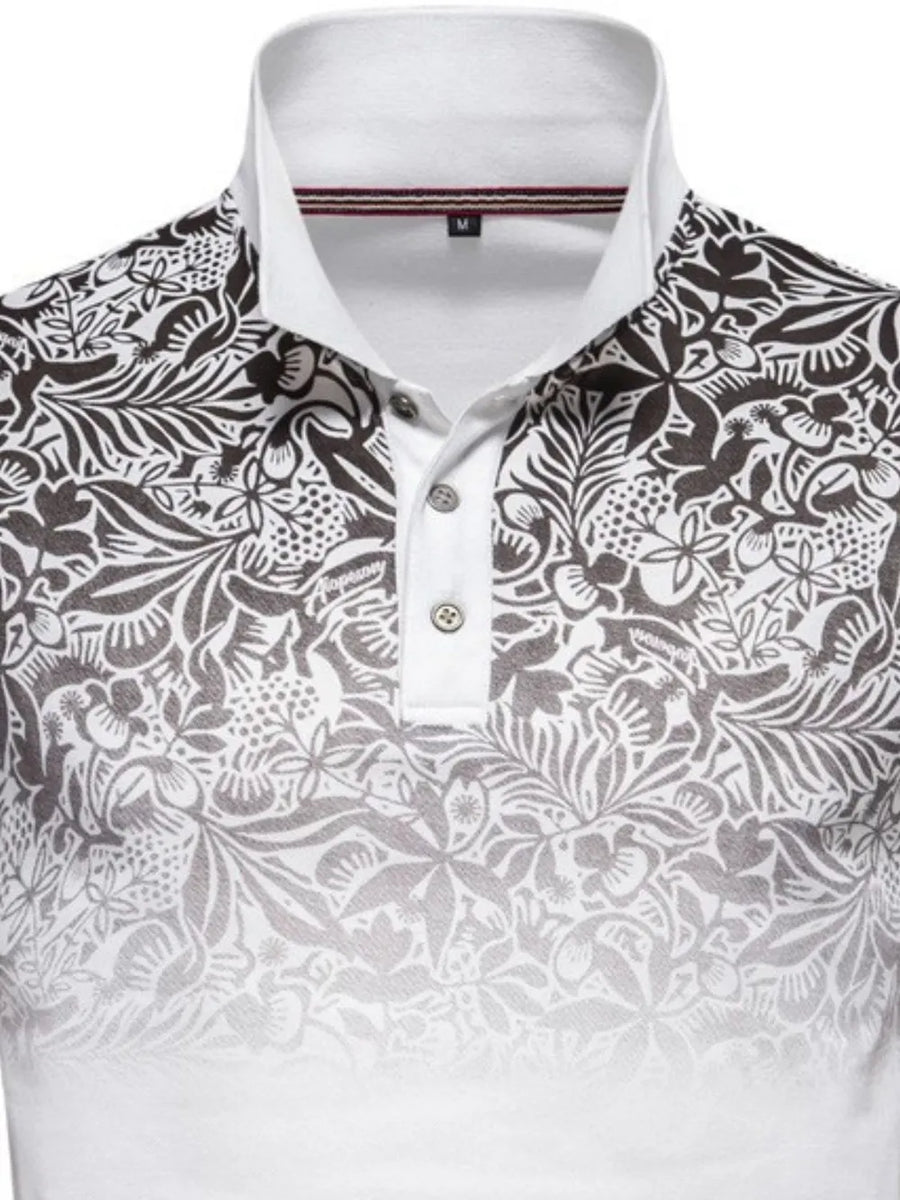 Floral ombre polo shirt with a white collar and button placket.