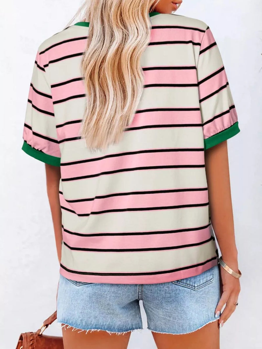 Classic striped crew neck tee in pink, black, and cream with green trim.