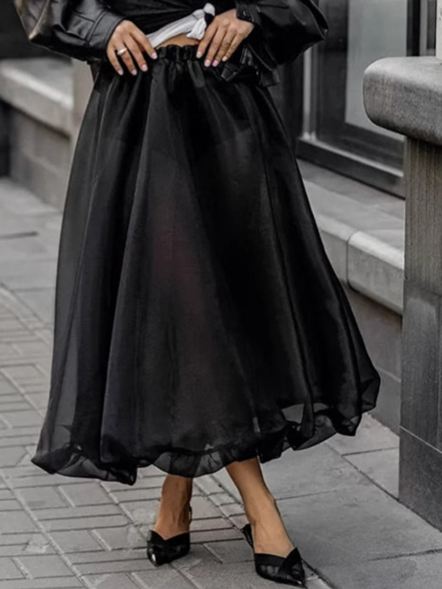 Black midi skirt with sheer overlay and ruffled hem, elastic waist
