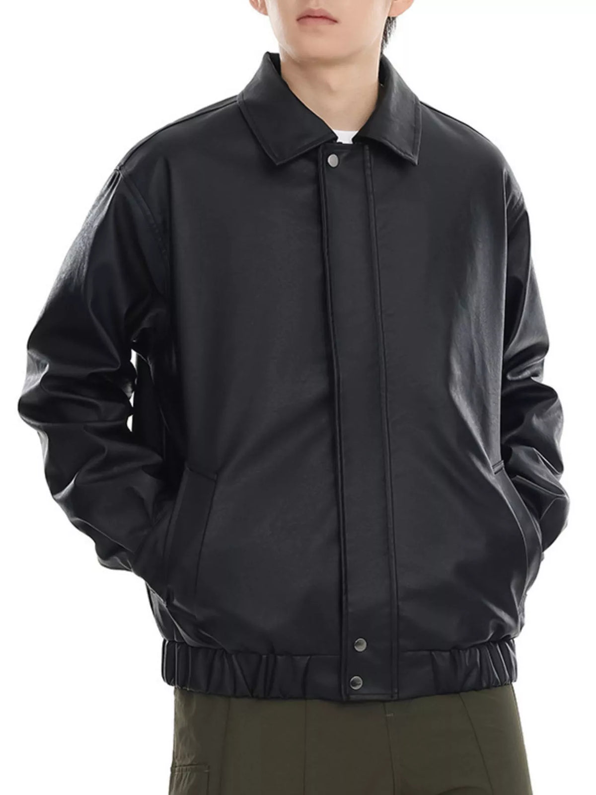 Black faux leather bomber jacket with collar and elastic cuffs.