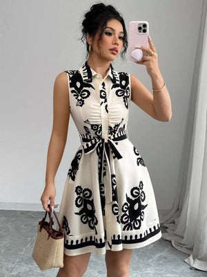 Charming Ruching Tie Waist Dress in black and white print, button-down, sleeveless, a-line skirt