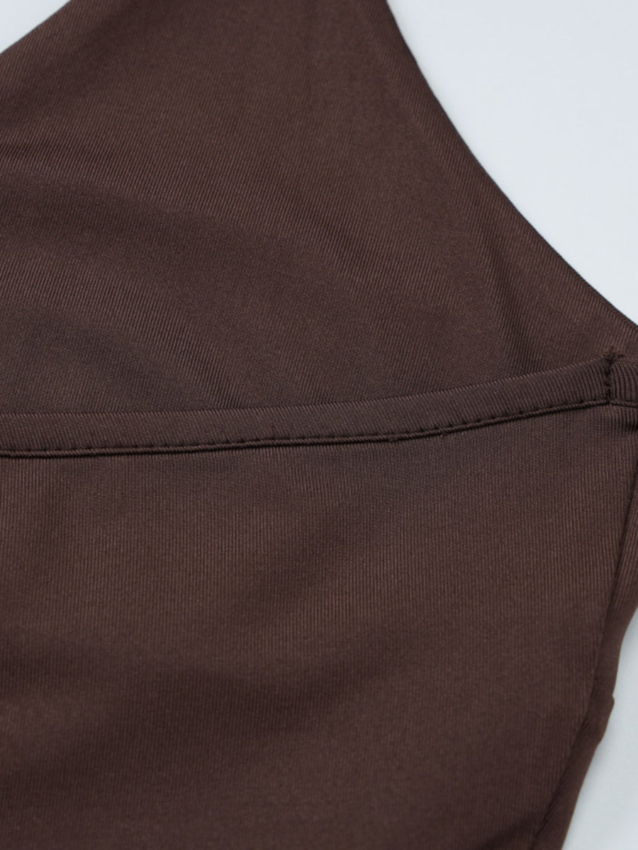 Coffee brown halter neck cami with twist detail and visible stitching.