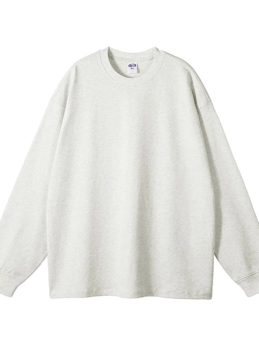 Light gray 100% cotton oversized crewneck sweatshirt with drop shoulders.