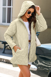 Beige diamond quilted hooded snap jacket with pockets and a relaxed fit.