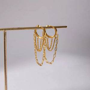 gold earrings with short drop and hinged closure
