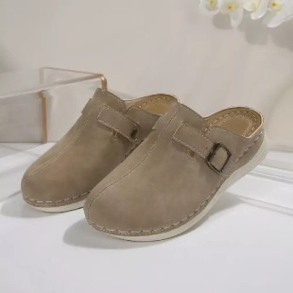Khaki buckle accent round-toe slip-on flats with contrast stitching.