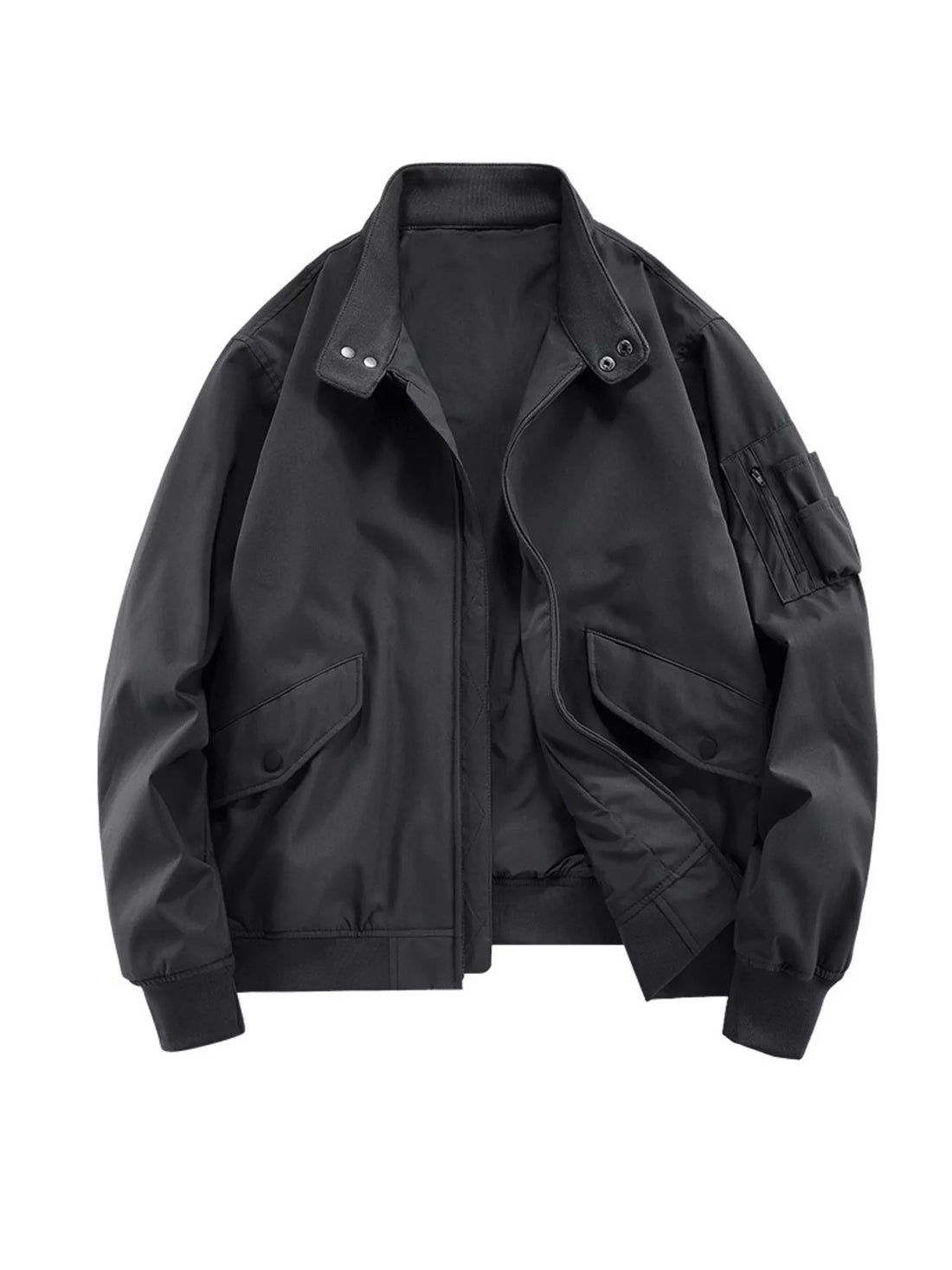 Plus-size black bomber jacket with zip front, snap flap pockets, and zippered sleeve pocket.