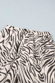 dark olive green wide-leg pants with drawstring and zebra-print