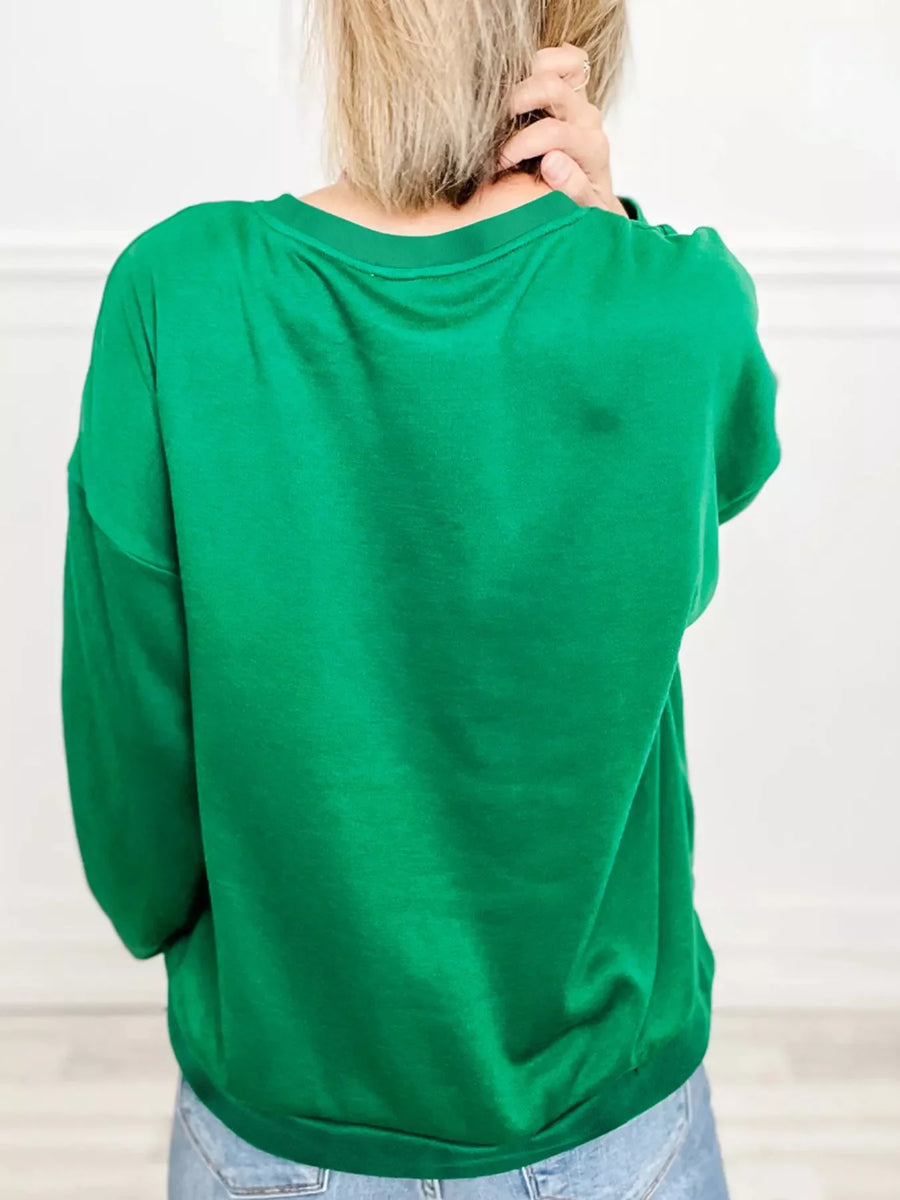 Green plaid letter graphic sweatshirt with crew neck and long sleeves.