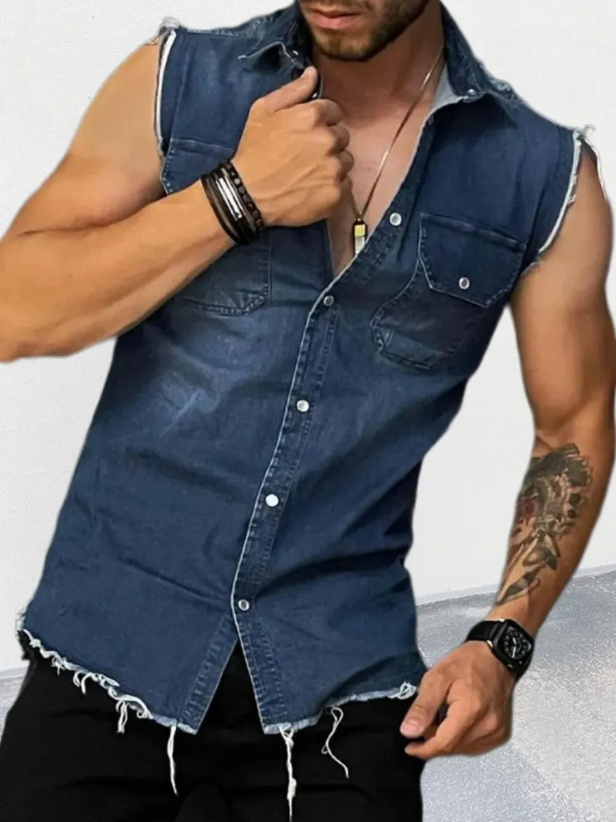 Men's raw-edge denim sleeveless shirt in navy with button-down front and chest pockets.